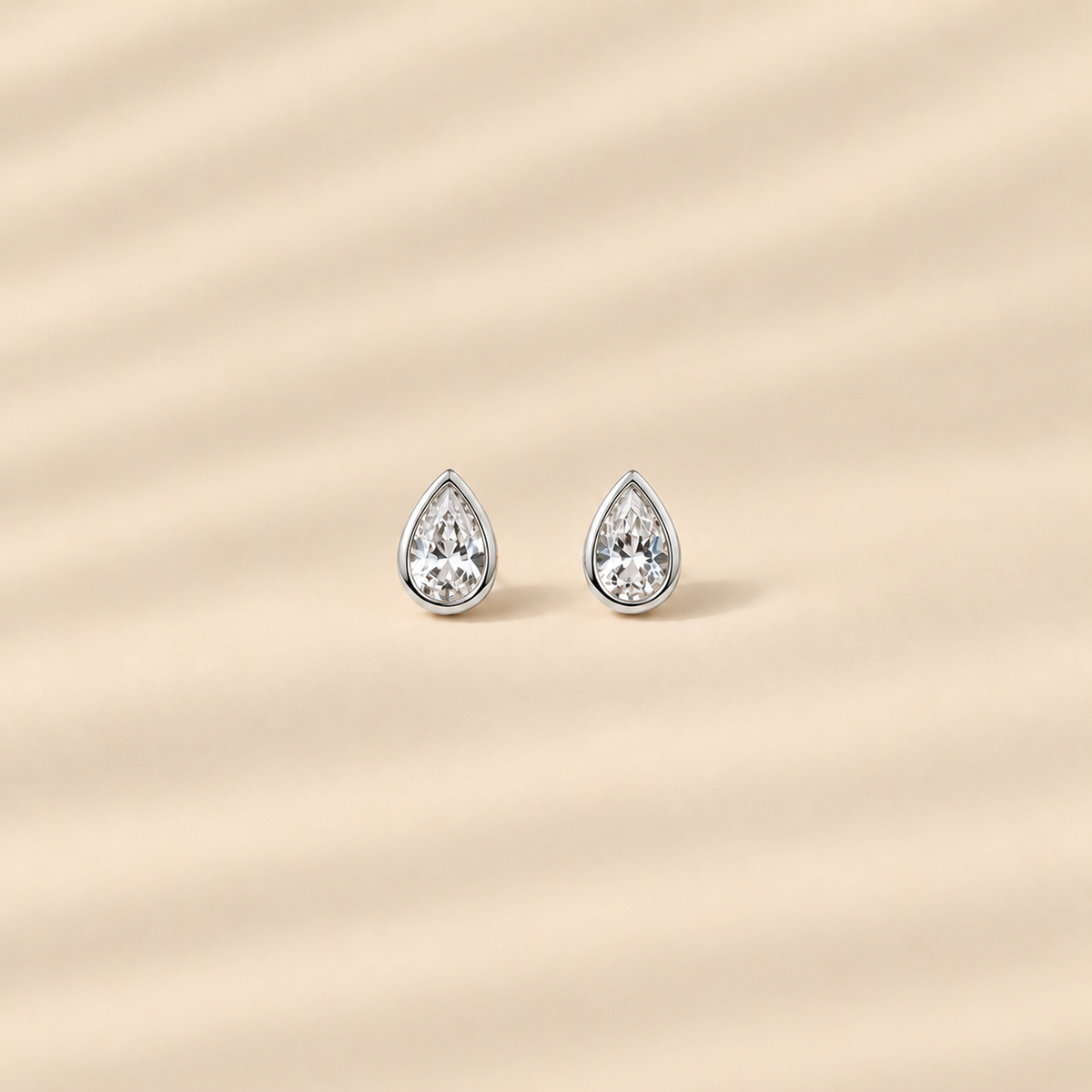 Aura — Sterling Silver Pear Cut Stud Earrings