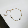Gold bracelet with hearts