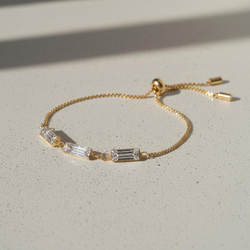 Gold bracelet with clear rhinestones