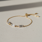 Gold bracelet with clear rhinestones