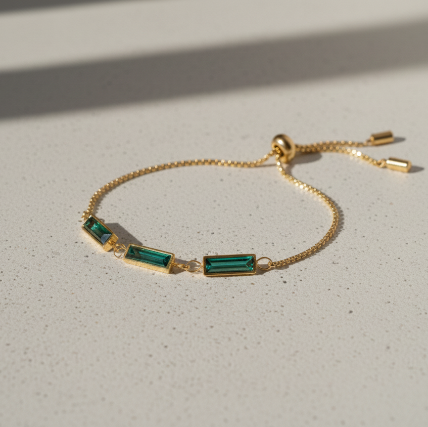 Gold bracelet with green emerald rhinestones