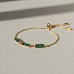Gold bracelet with green emerald rhinestones