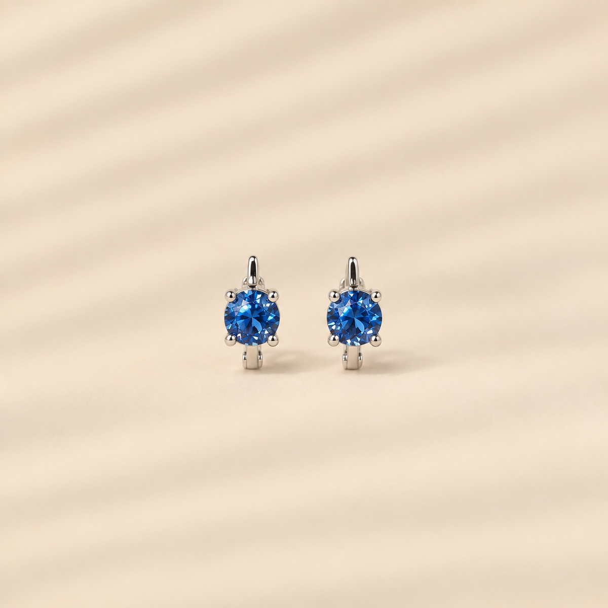 Lorelei — Sterling Silver Blue Round Cut Huggie Earrings