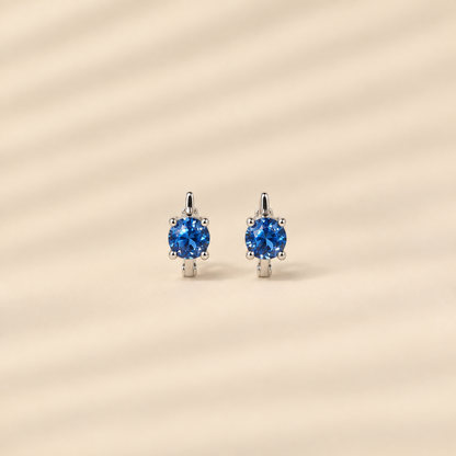 Lorelei — Sterling Silver Blue Round Cut Huggie Earrings