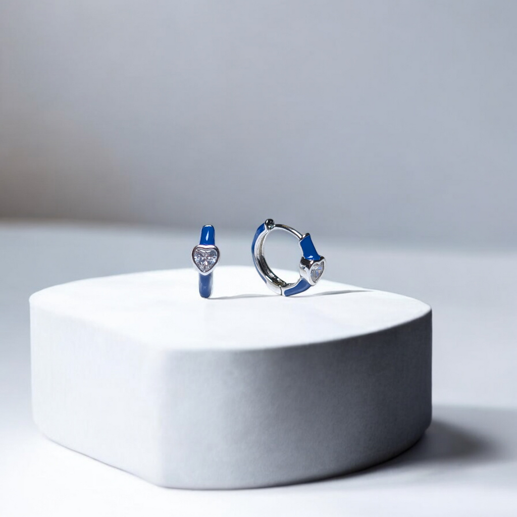 Sapphire heart huggie earrings