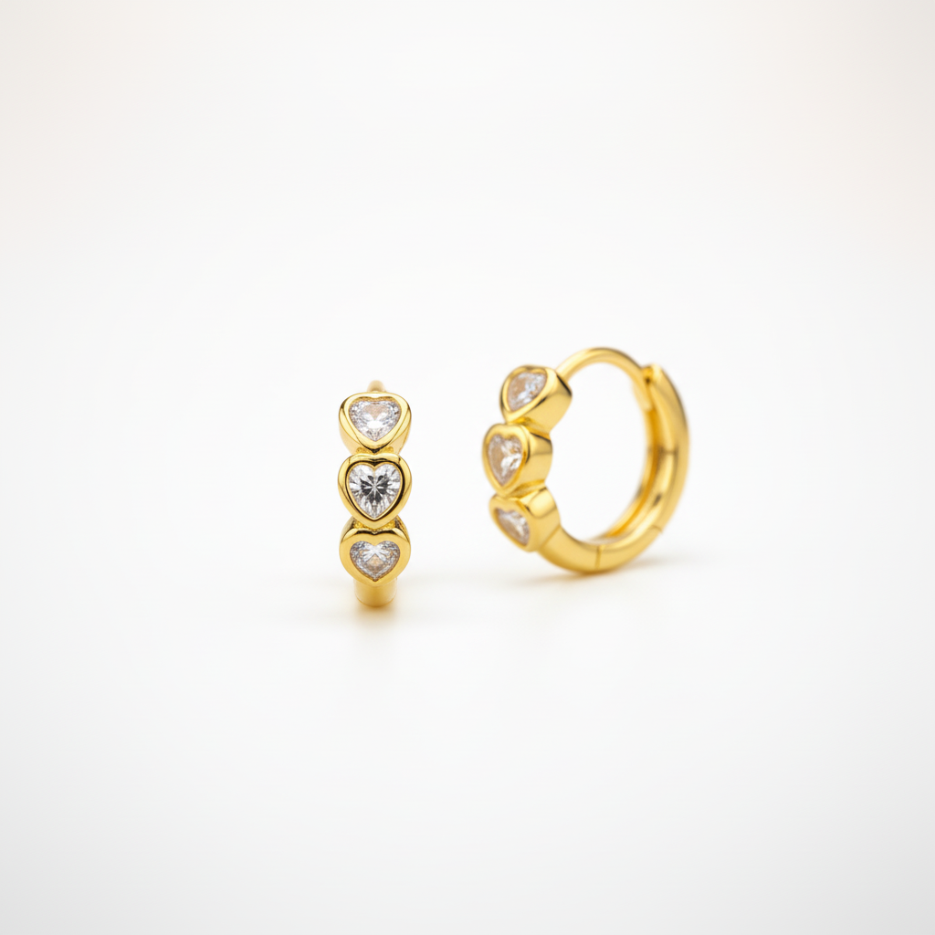Gold hoop earrings with heart-shaped CZ