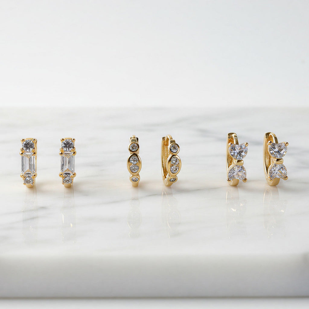 Trinity — Set of Three Huggie Earrings