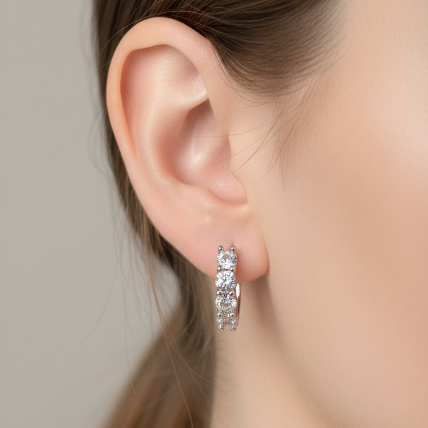 Pair of silver hoop earrings with clear CZ stones 