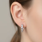 Pair of silver hoop earrings with clear CZ stones 