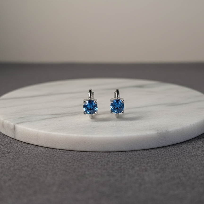 Lorelei — Sterling Silver Blue Round Cut Huggie Earrings