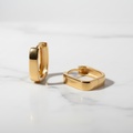 Two gold hoop earrings Sterling Silver