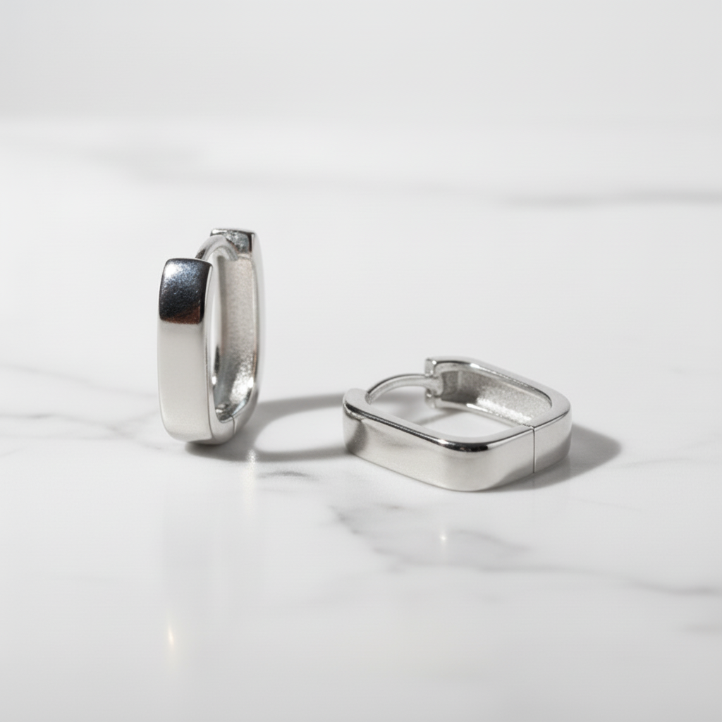 Clara — Sterling Silver High Polished Huggie Earrings