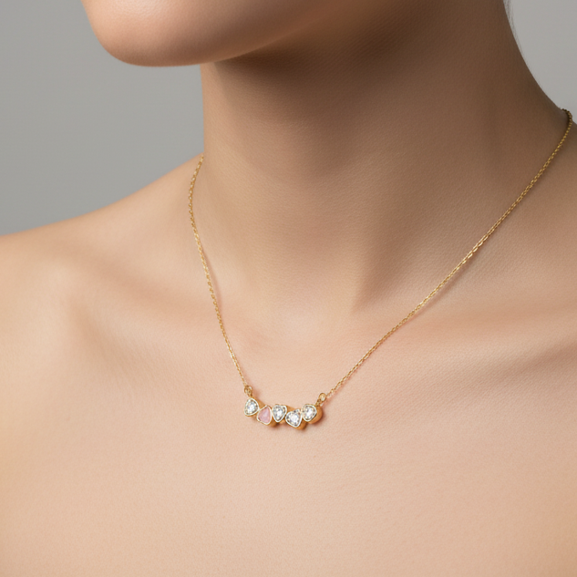 Gold necklace with heart shape pendant