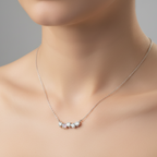 Silver necklace with heart-shaped pendants 